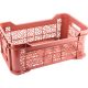 A pink plastic storage basket