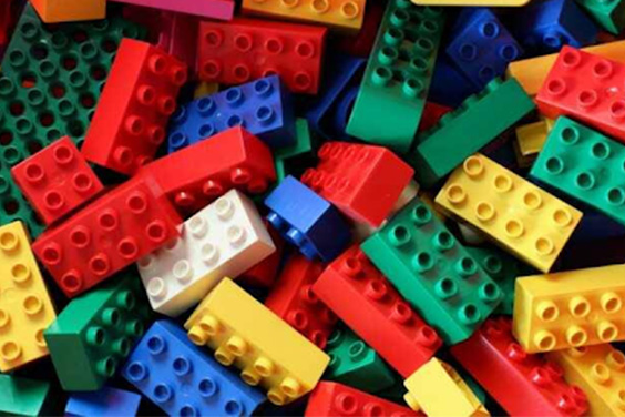 Injection molded lego plastic pieces.
